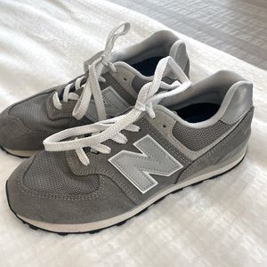 Boys New Balance Classic 574 Tennis Shoes in great used condition.